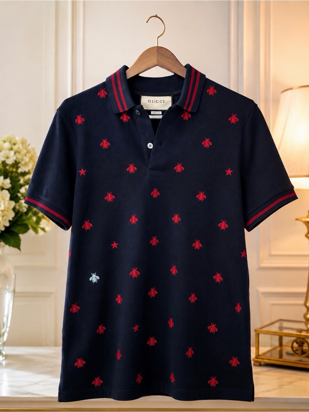 Authentic Gucci navy blue polo shirt with red embroidered bee and star motifs